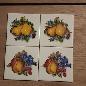 4 tile coasters with fruit and flowers